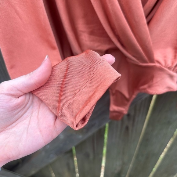 Free People Turnt Metallic Shiny Peach Orange V Neck Drapey Long Sleeve Bodysuit - Picture 9 of 13